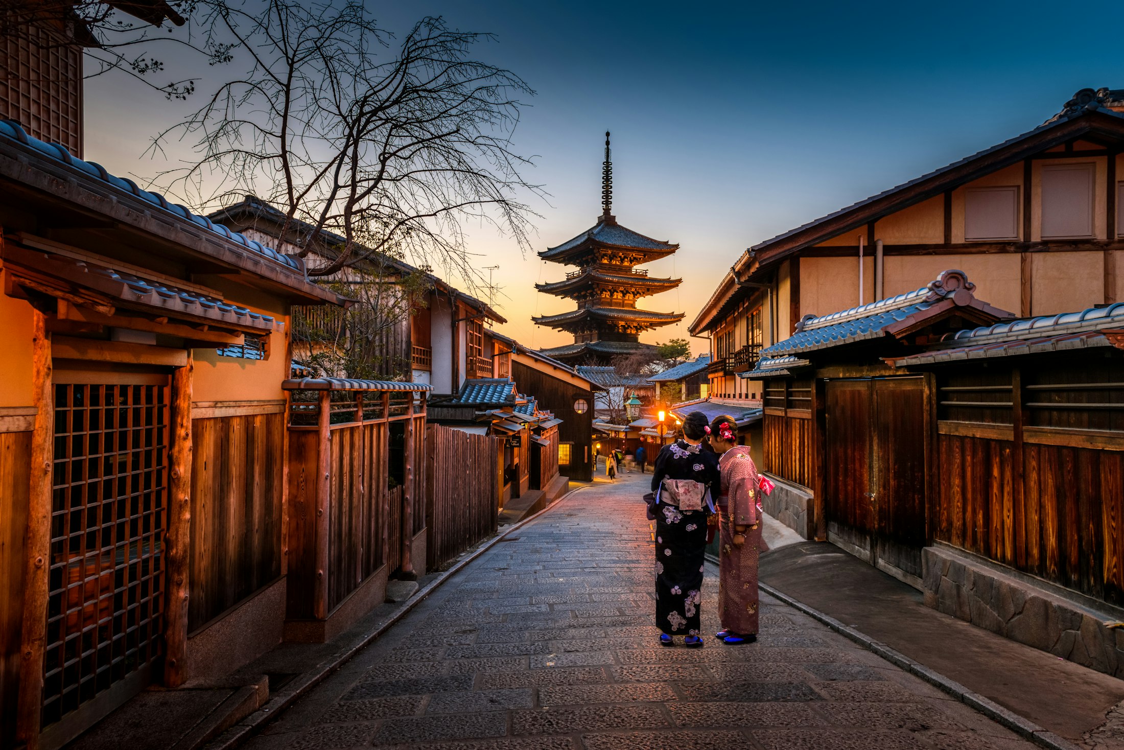 Travellers in a historic Kyoto street
